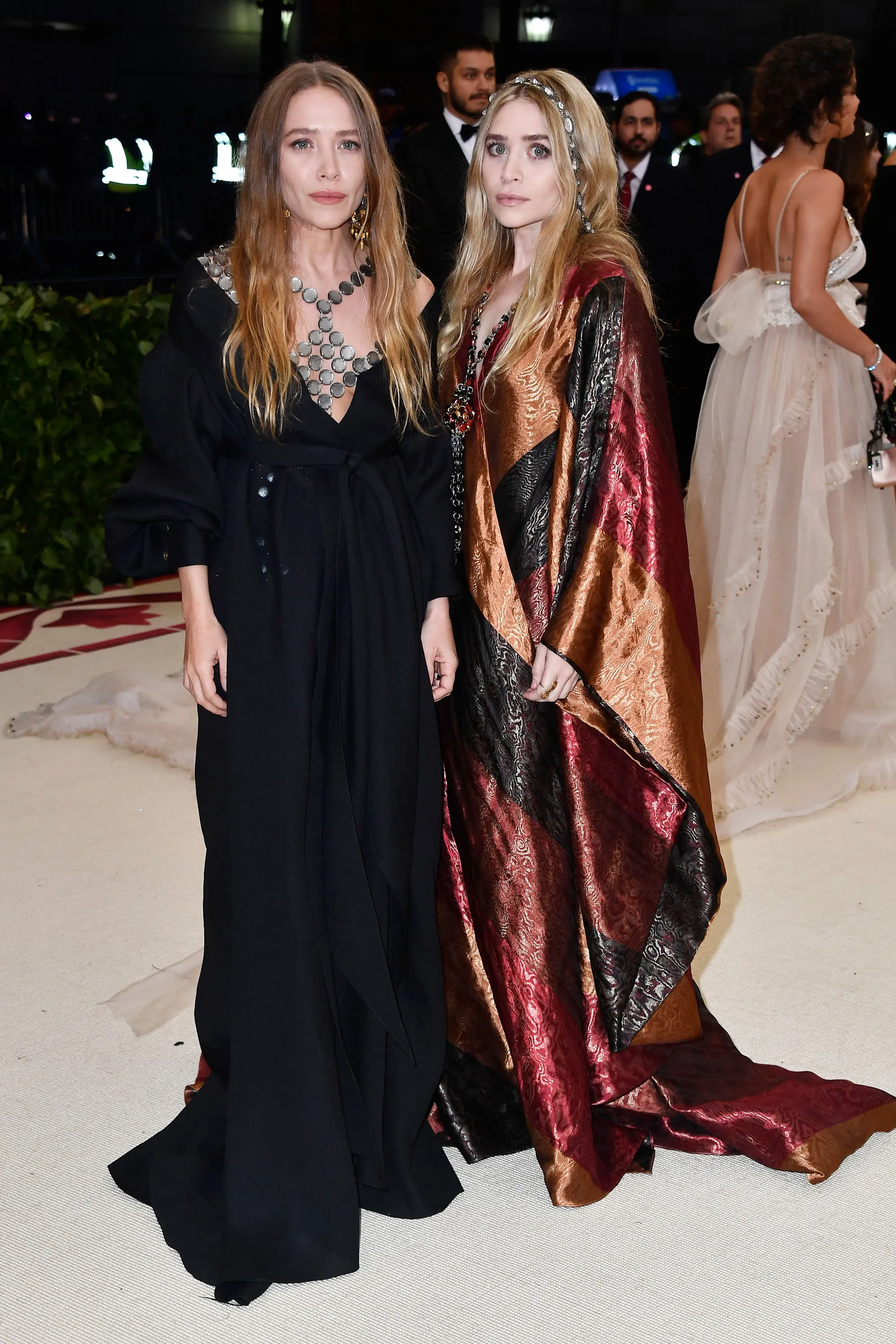 Ashley and Mary-Kate Olsen at a fashion event