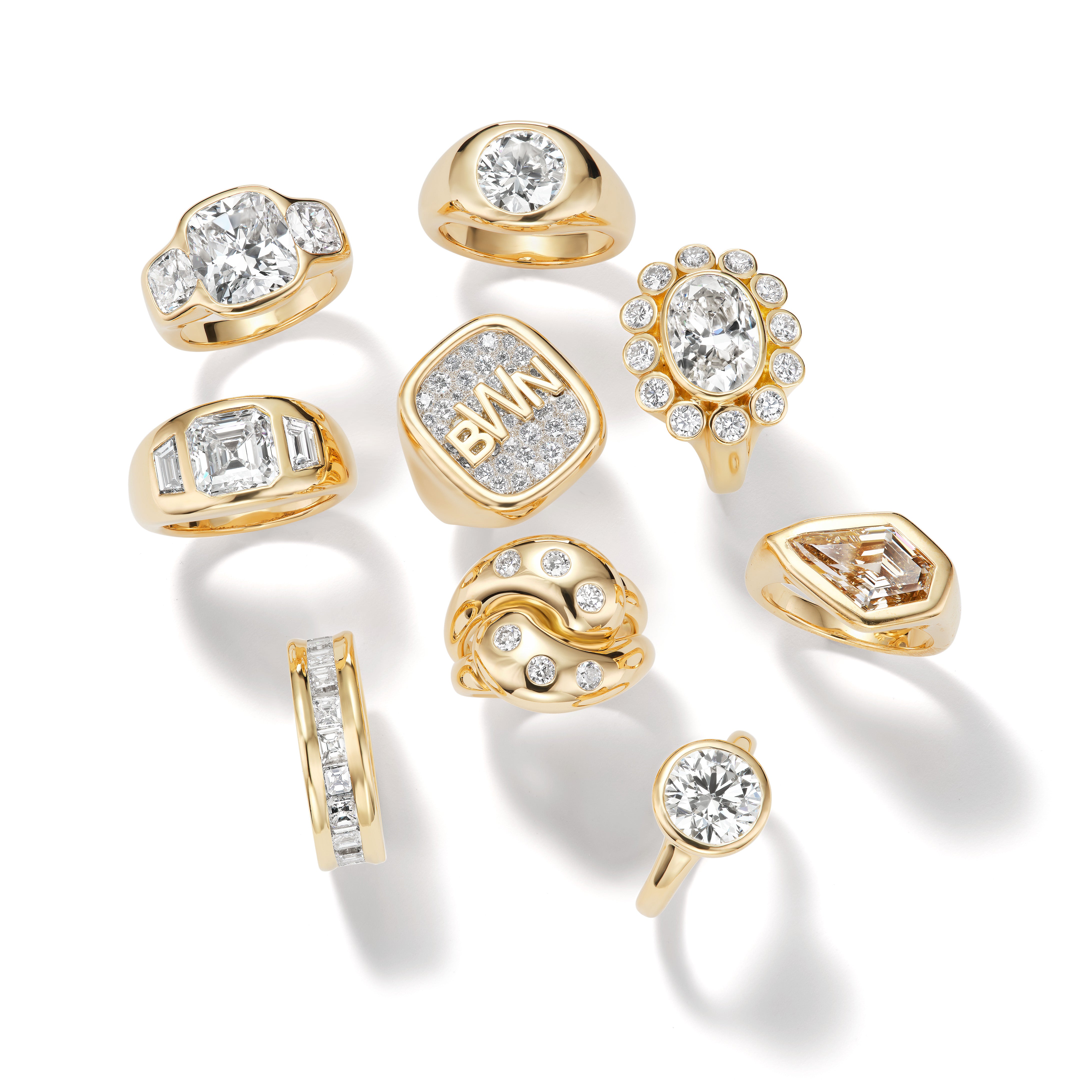 A selection of Brent Neale diamond rings in yellow gold