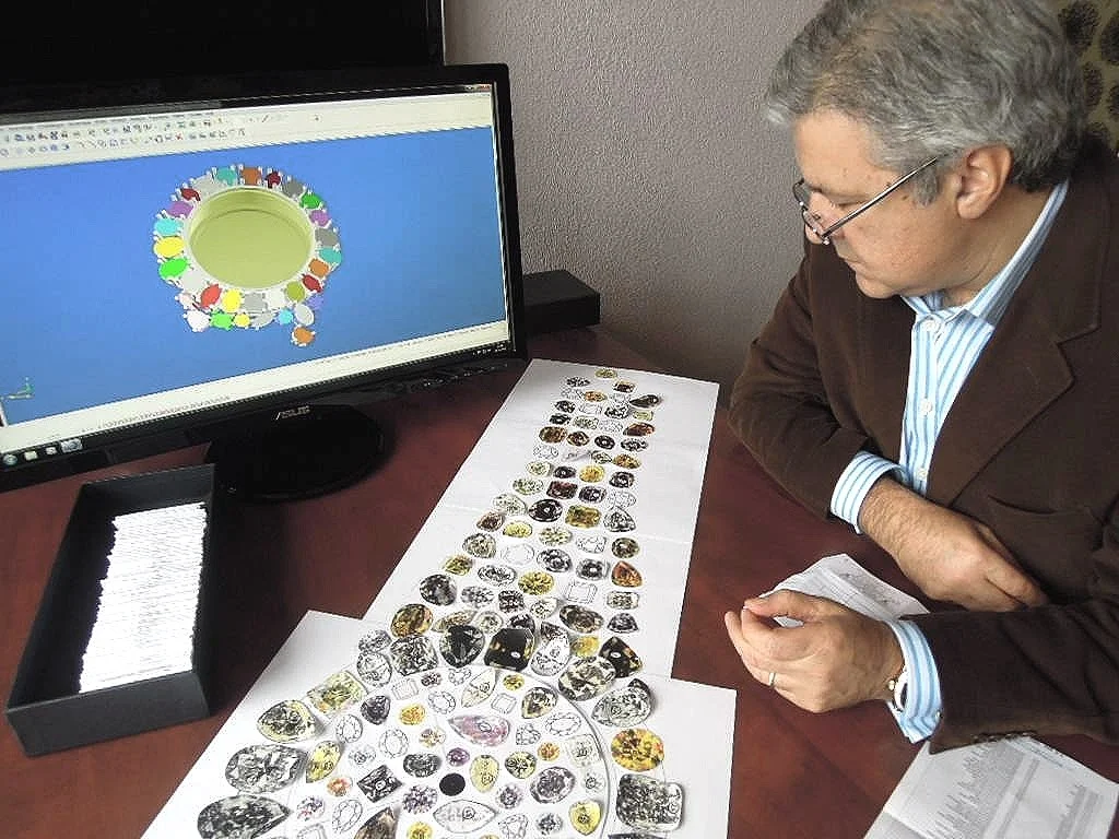 Vartkess Knadjian inspecting a diamond