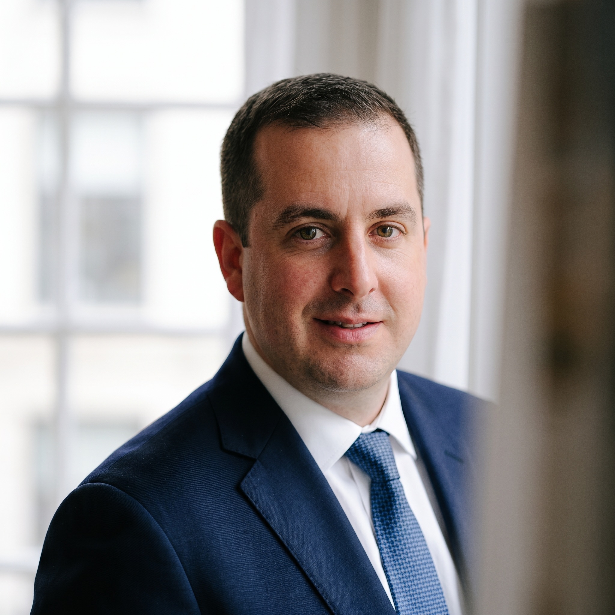 Daniel Mercer — Publisher & Editorial Director